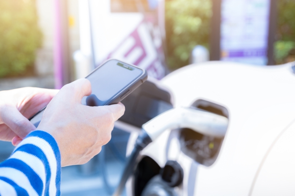 Someone uses smartphone EV charging tech to charge their EV