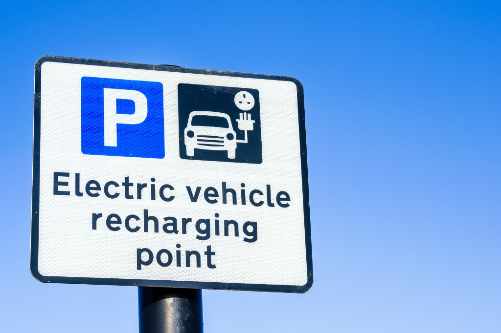 A UK signpost for an EV recharging point