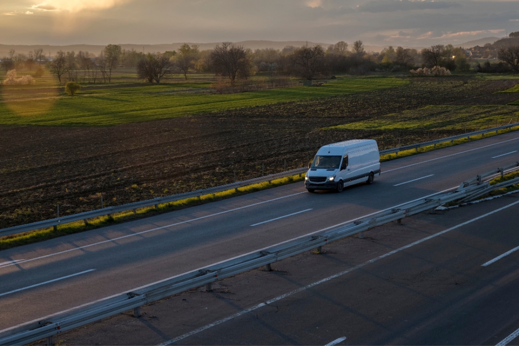 A van drives along a UK road